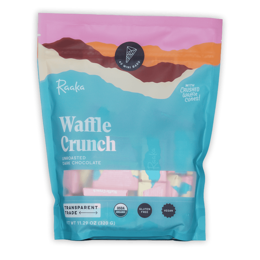 Raaka Waffle Crunch 61% unroasted dark mini bars in pink teal pouch