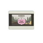 Ranger rosé bonbons box with six pink and brown candies in a white rectangular box featuring forest imagery