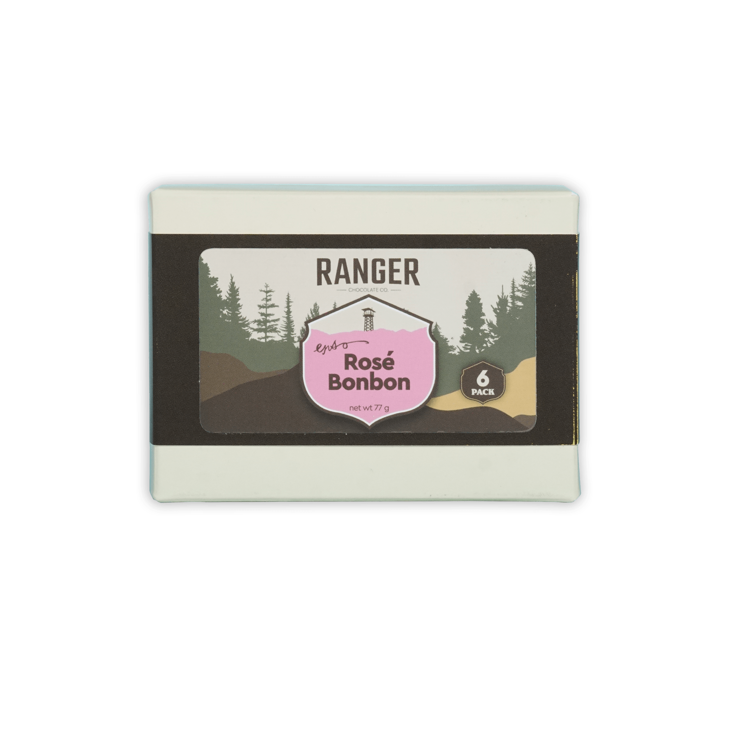 Ranger rosé bonbons box with six pink and brown candies in a white rectangular box featuring forest imagery