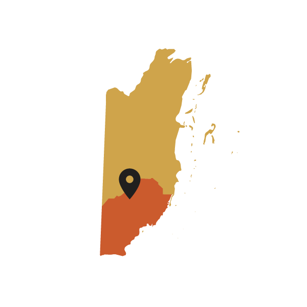 Map of Belize with a black marker pointing to a Toledo region