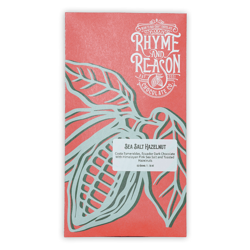 Rhyme and Reason Dark Chocolate w/ Salted Hazelnuts 72% coral wrapper