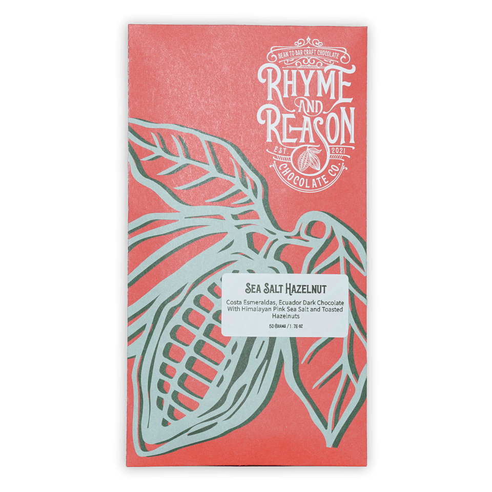 Rhyme and Reason Dark Chocolate w/ Salted Hazelnuts 72% coral wrapper