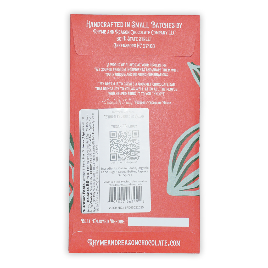Back of Rhyme and Reason Dark Spicy Paprika 75% bar: red wrapper with green leaf design and white ingredient text