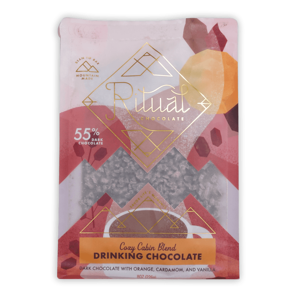 Ritual drinking chocolate cozy cabin 55 percent in pink and gold foil pouch with geometric mountain design
