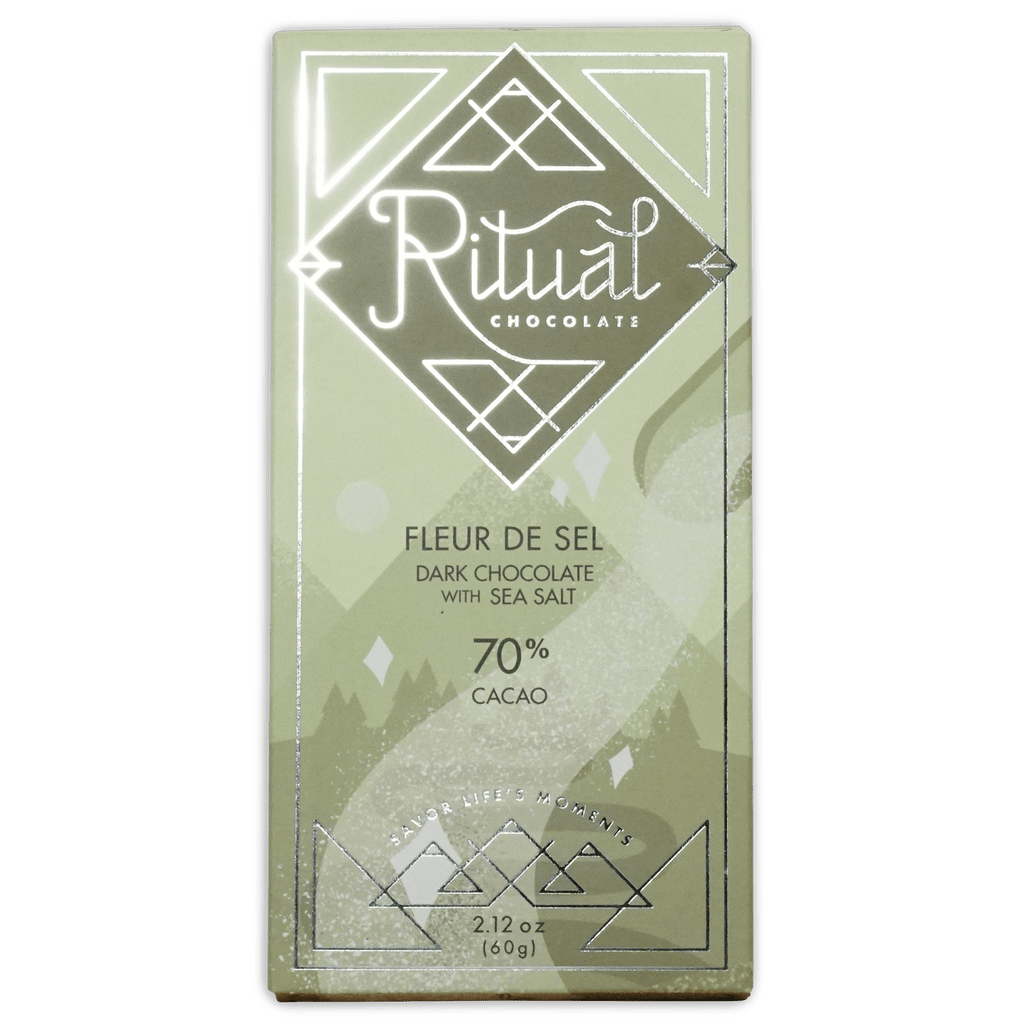 Ritual Chocolate Fleur de Sel bar in a sage green box with silver diamond logo, reading Dark Chocolate with Sea Salt, 70% Cacao.