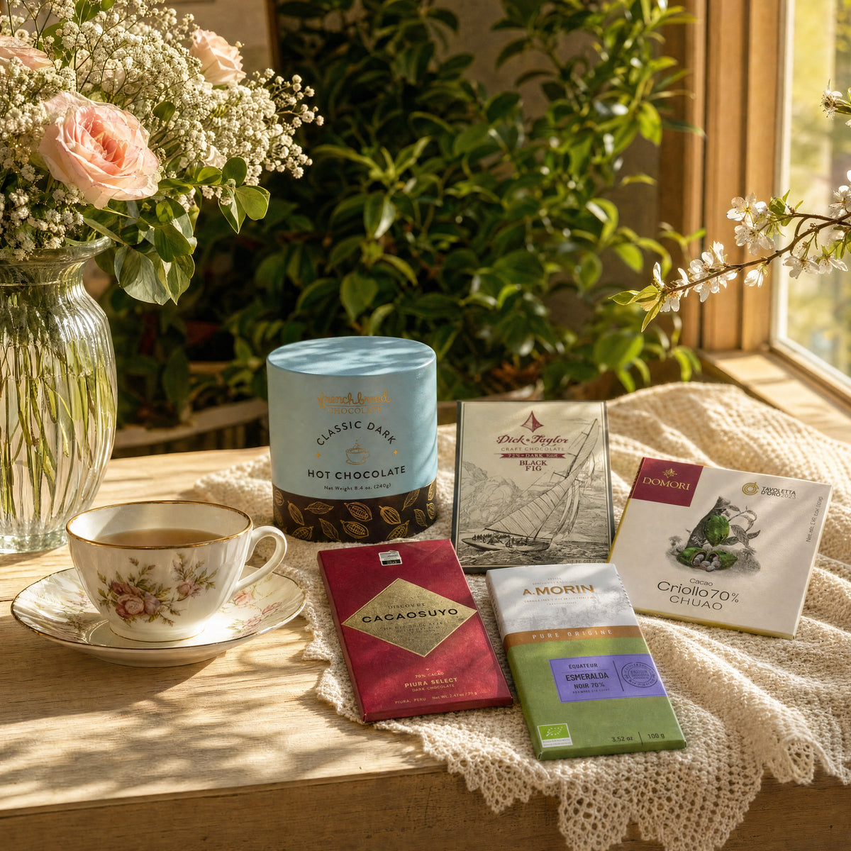 Sending Solace dark chocolate gift bundle, bars and hot chocolate by a teacup.