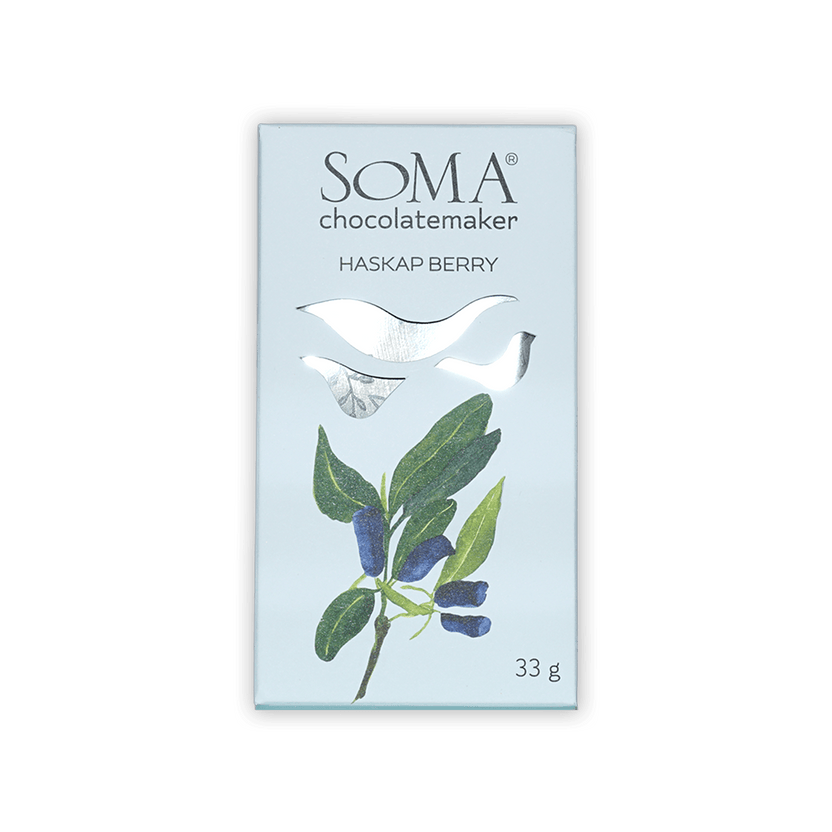Soma Mini Haskap Berry light blue chocolate package with berry leaves illustration