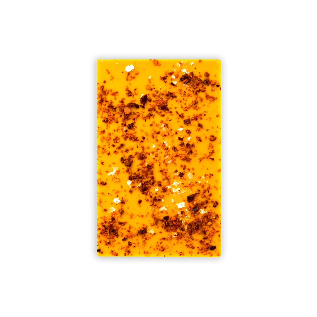 Soma Mini Mango Chili Bar: vibrant orange bar with brown and white specks
