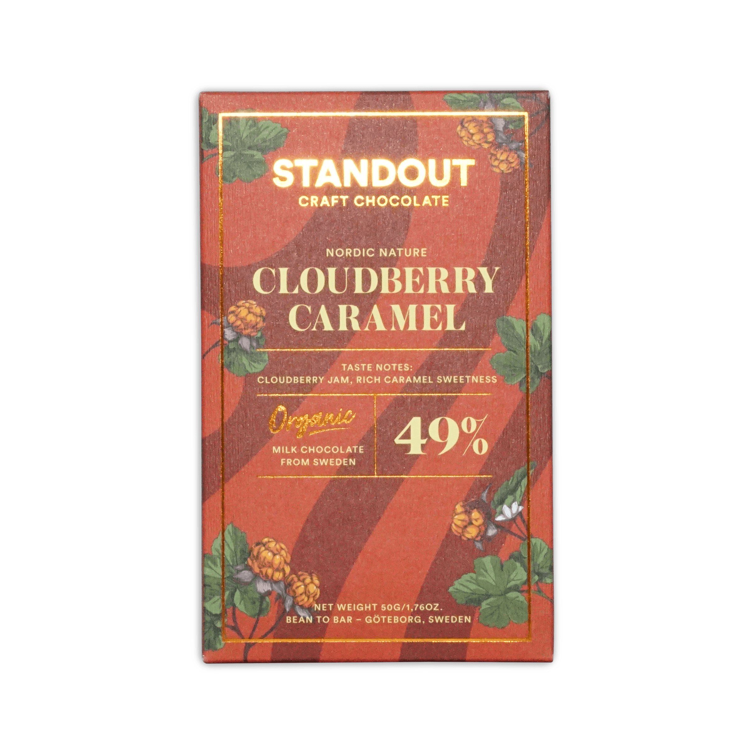 A red and gold packaged standout craft chocolate bar with nordic nature cloudberry caramel organic milk chocolate from Sweden