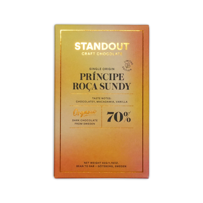 Standout chocolate príncipe roça sundy 70% dark chocolate bar with gradient gold to orange wrapper and black gold text