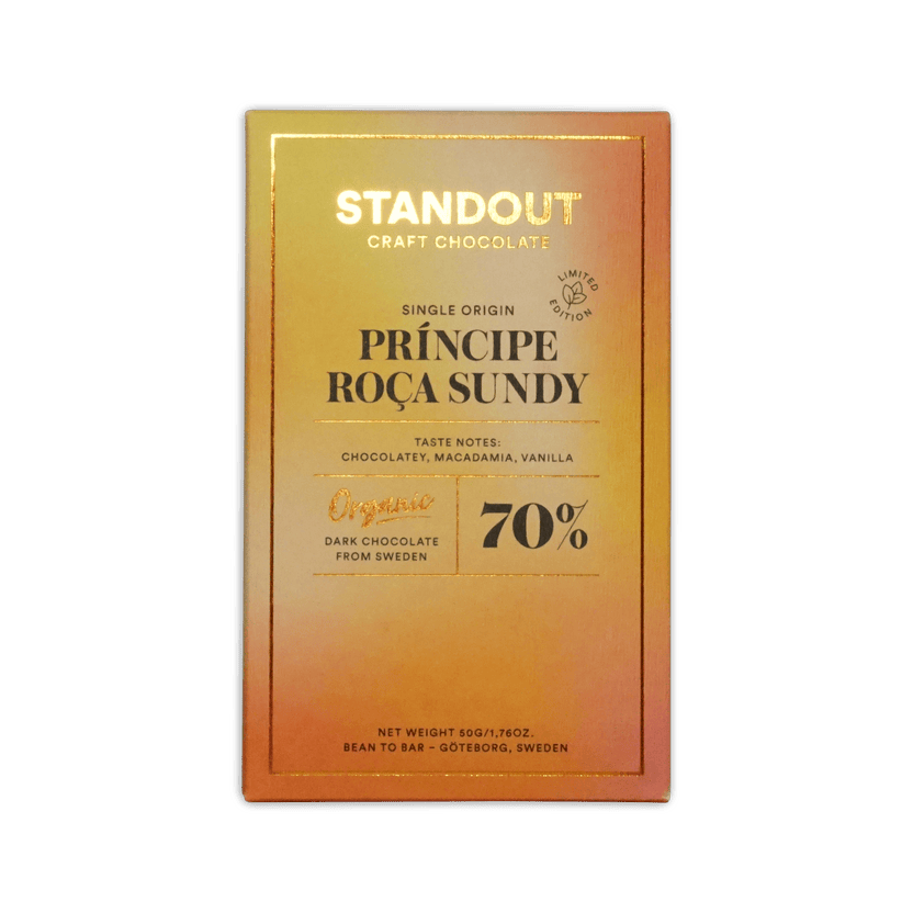 Standout chocolate príncipe roça sundy 70% dark chocolate bar with gradient gold to orange wrapper and black gold text