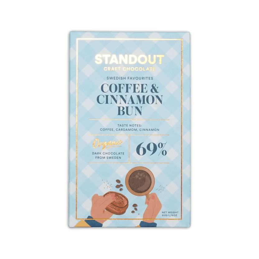 Standout Craft Chocolate bar, light blue gingham box reading Coffee & Cinnamon Bun 69%, with coffee and bun illustration.