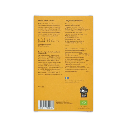 Yellow cardboard box of standout chocolate uganda semuliki forest 100 percent with black text and barcode on back side