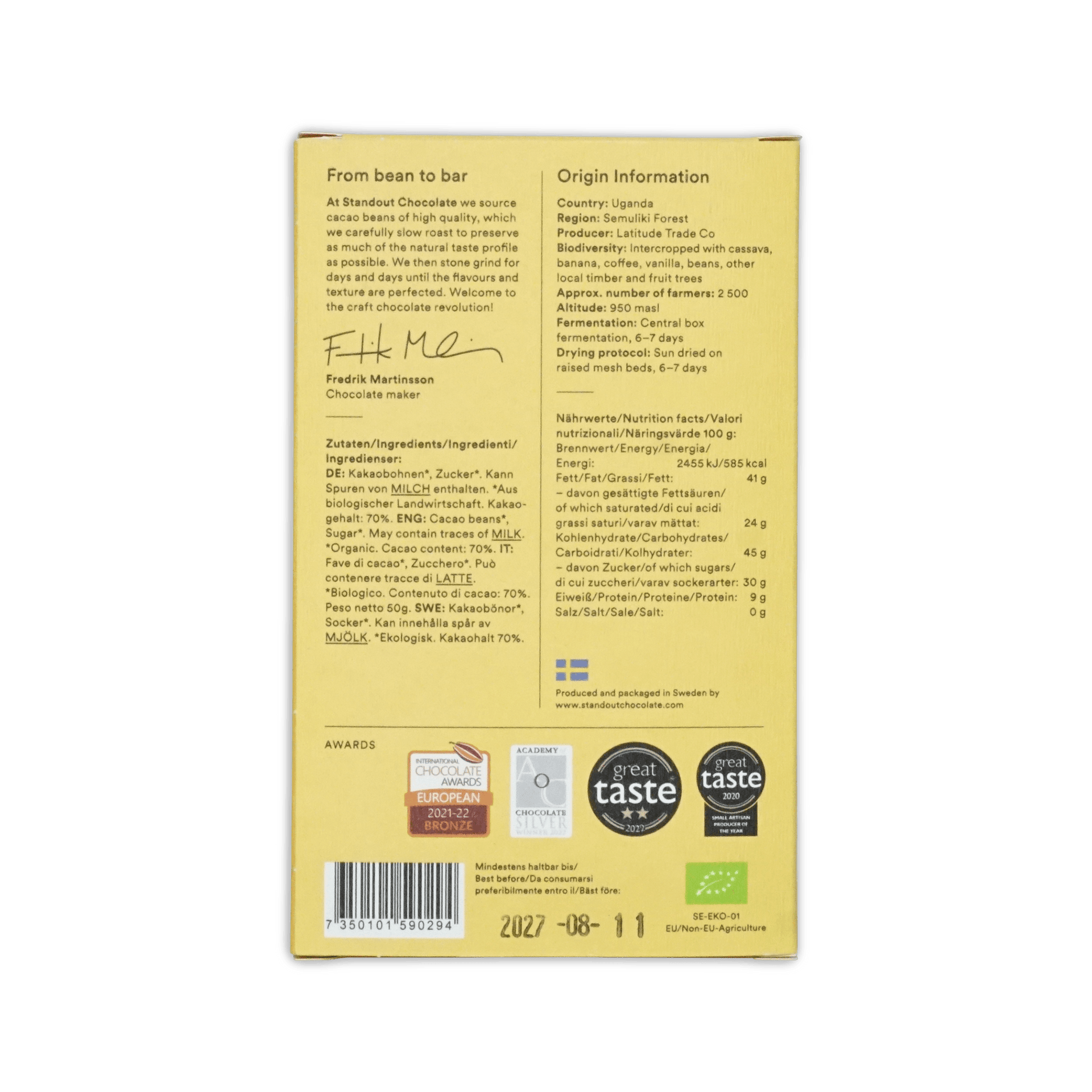 Back of the gold Standout Chocolate Uganda box with bean-to-bar text, origin information, nutrition facts, award badges, and a barcode.