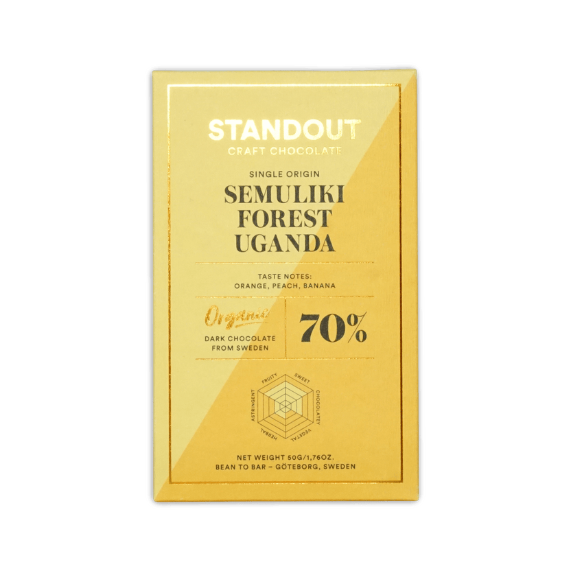 Standout Chocolate Semuliki Forest Uganda bar in a gold box, reading Single Origin, Organic, 70%, with a flavor radar chart.