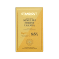 A golden-yellow rectangular chocolate bar wrapper from standout craft chocolate with gold foil lettering and a hexagonal flavor diagram for uganda semuliki forest 85 percent