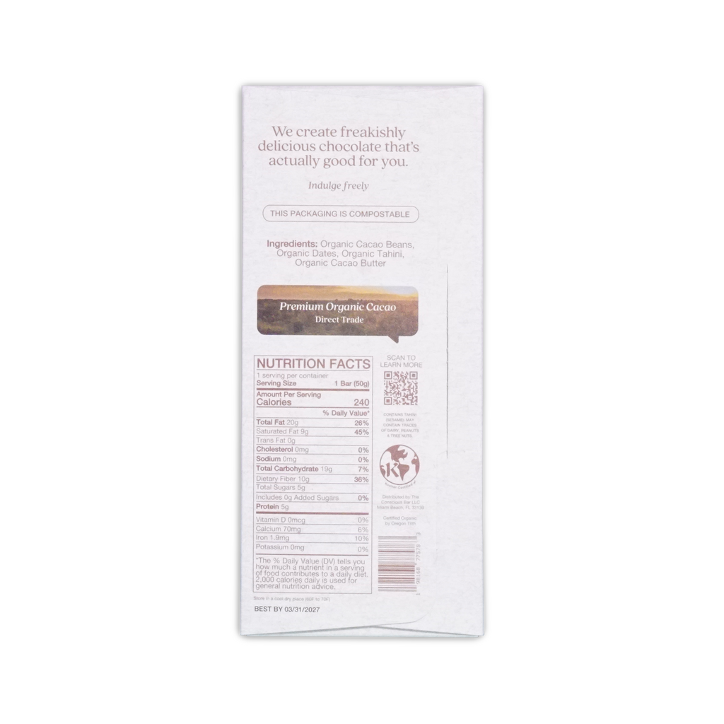 White rectangular package of the conscious bar organic dark creamy tahini 72 percent chocolate with brown label and black text
