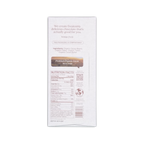 White rectangular package of the conscious bar organic dark creamy tahini 72 percent chocolate with brown label and black text