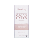 A white rectangular package of the conscious bar dark creamy tahini 72 percent cacao and dates chocolate bar with pink stripe