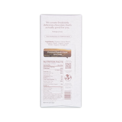 White rectangular chocolate bar wrapper with brown and black text featuring premium organic cacao branding for the conscious bar dark orange blossom 72%
