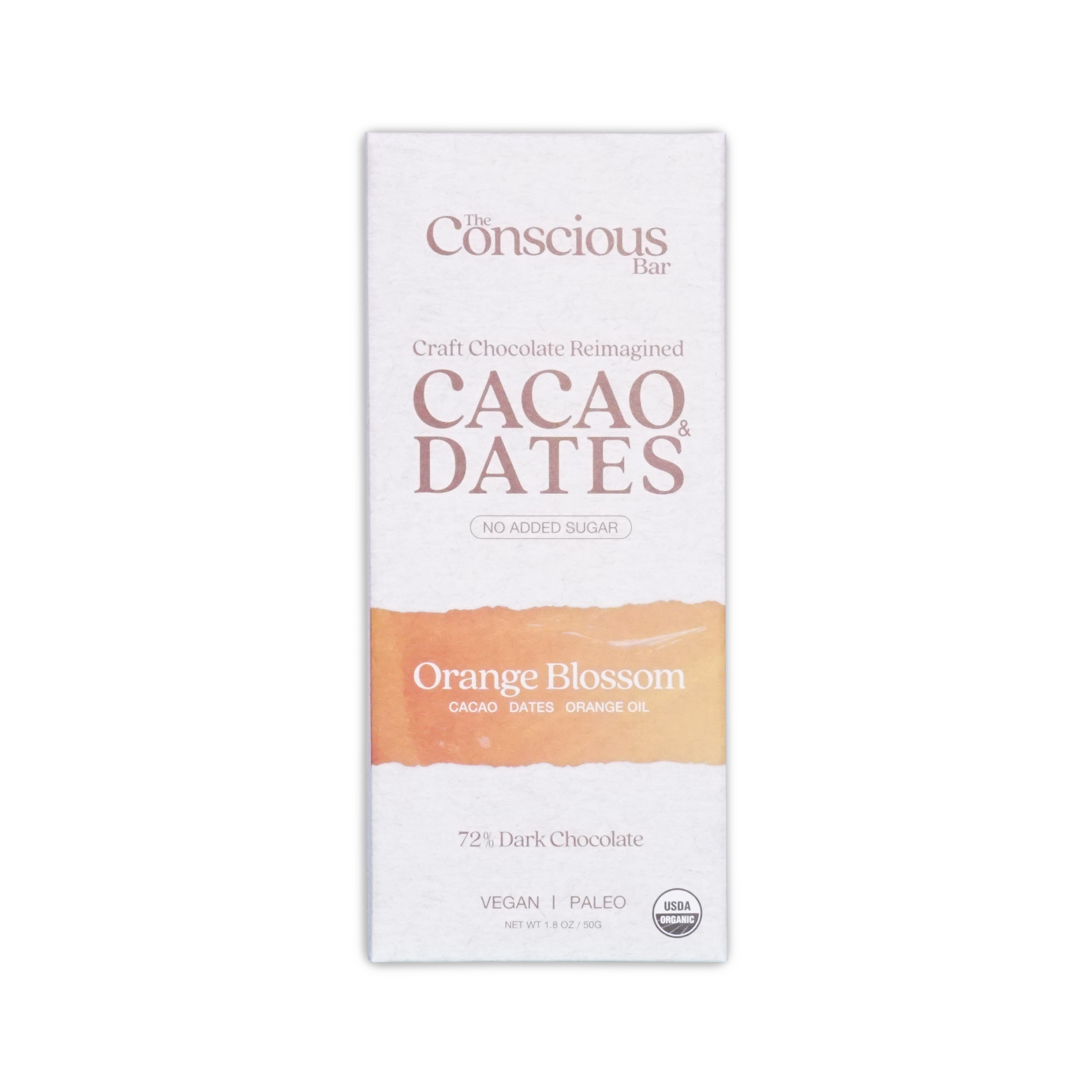 The conscious bar dark orange blossom 72 percent cacao and dates chocolate bar in white and peach minimalist wrapper