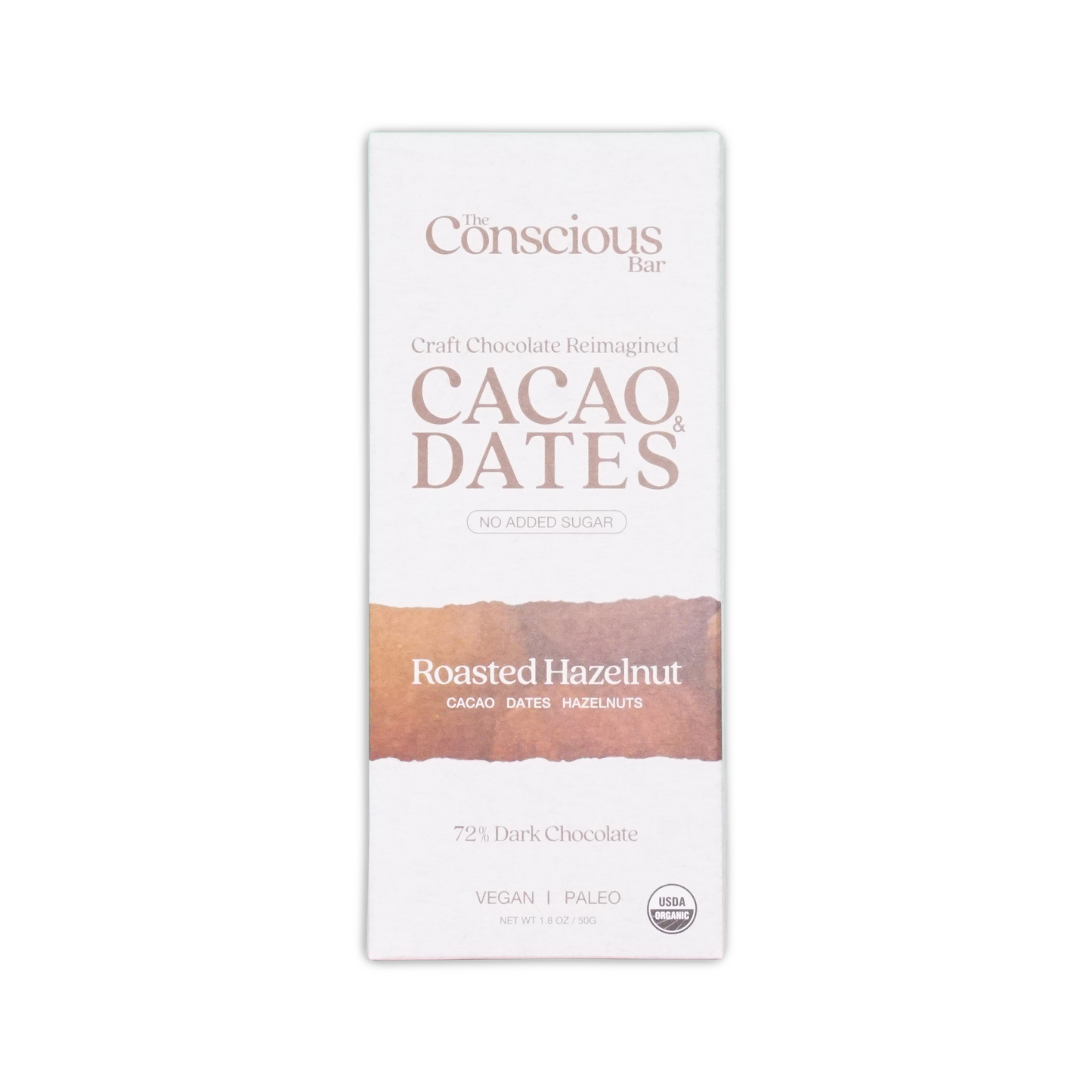 The conscious bar dark roasted hazelnuts 72 percent chocolate bar in white and brown minimalist packaging