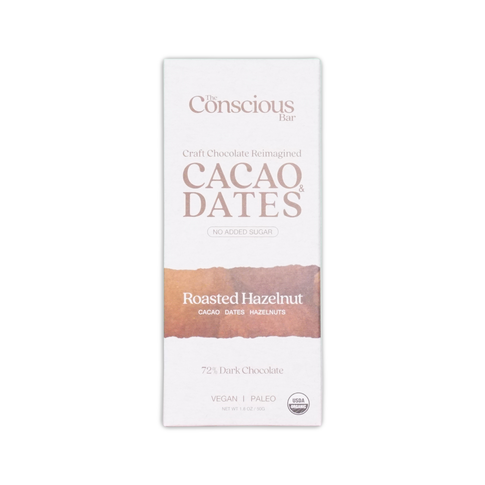 The conscious bar dark roasted hazelnuts 72 percent chocolate bar in white and brown minimalist packaging