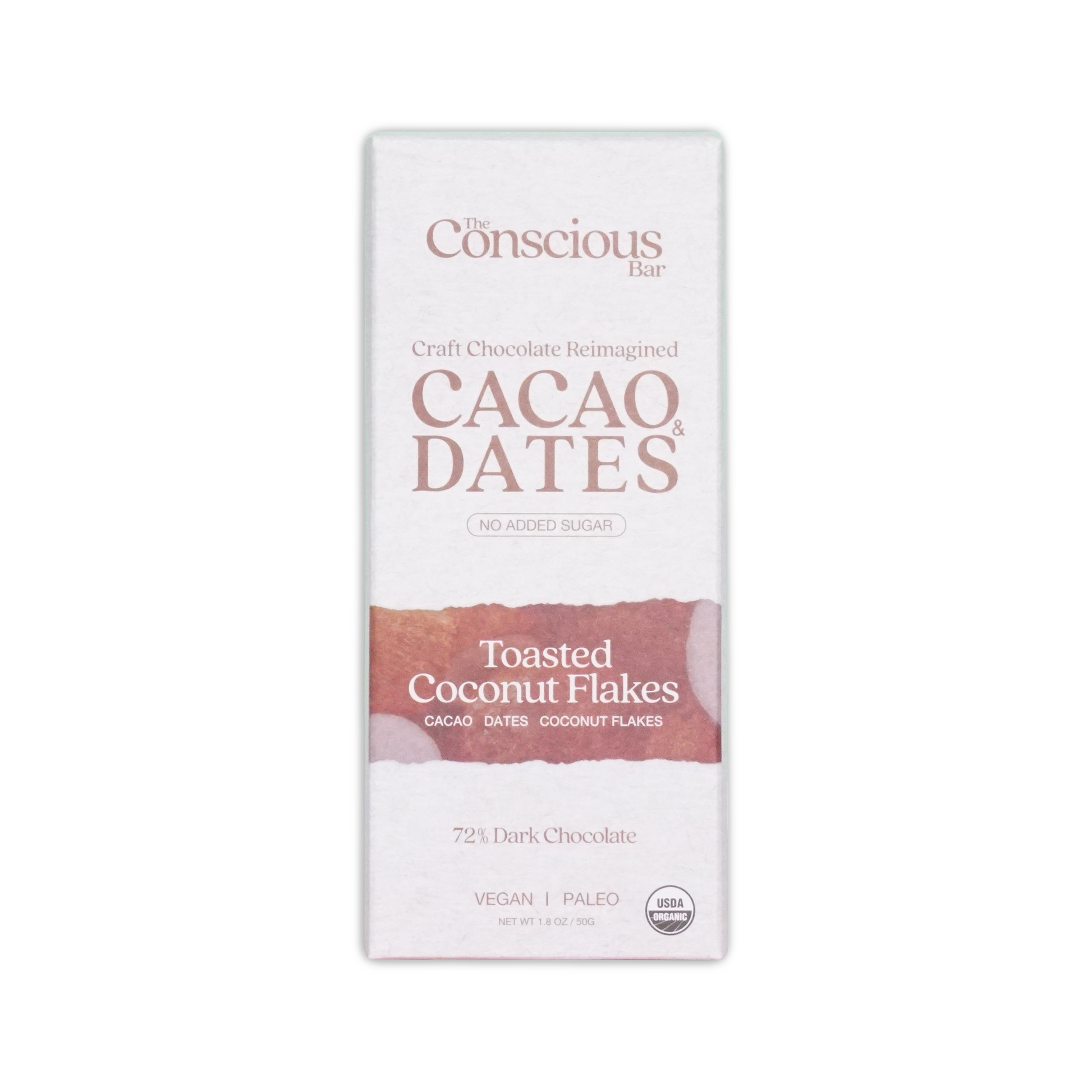A white rectangular box of the conscious bar dark toasted coconut 72% cacao and dates chocolate with vegan paleo label