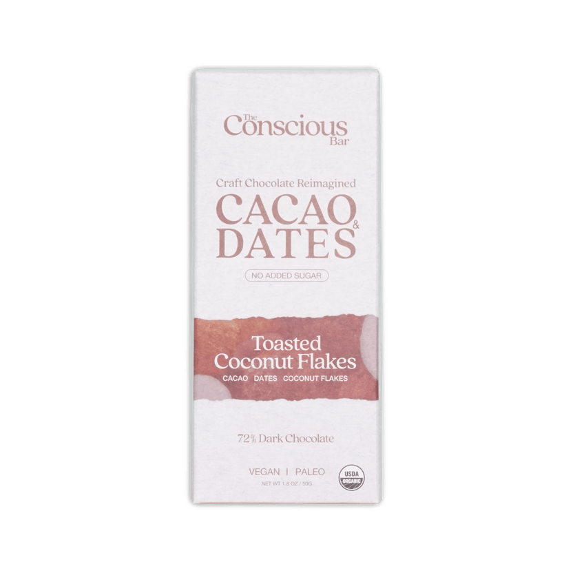 A white rectangular box of the conscious bar dark toasted coconut 72% cacao and dates chocolate with vegan paleo label
