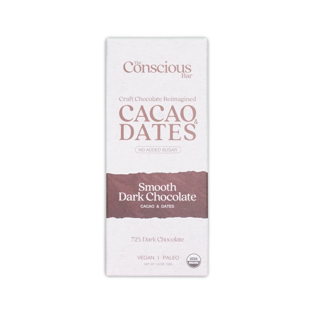 The conscious bar smooth dark chocolate 72 percent in minimalist white and brown packaging with cacao and dates