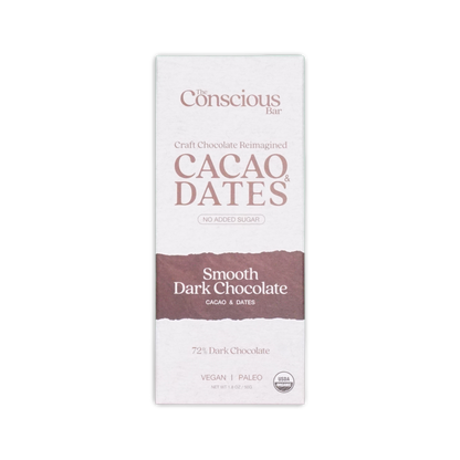 The conscious bar smooth dark chocolate 72 percent in minimalist white and brown packaging with cacao and dates