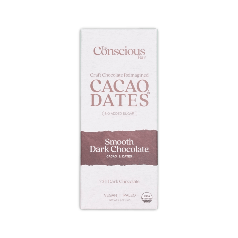 The conscious bar smooth dark chocolate 72 percent in minimalist white and brown packaging with cacao and dates