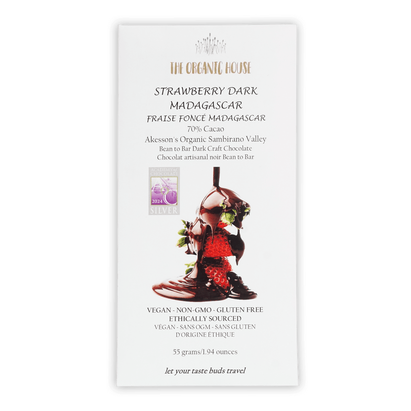 White rectangular wrapper for the organic house strawberry dark madagascar chocolate bar with strawberries and green leaves