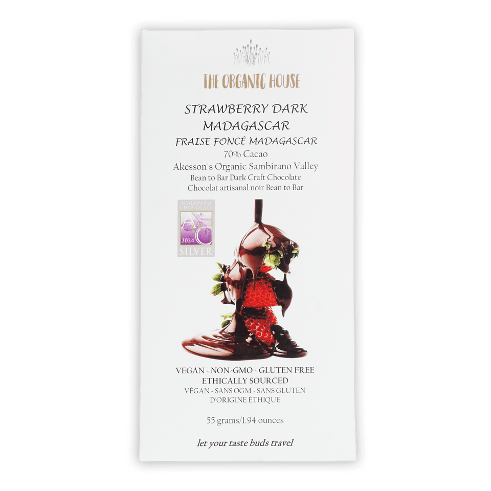 White rectangular wrapper for the organic house strawberry dark madagascar chocolate bar with strawberries and green leaves