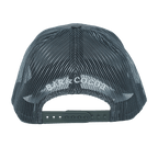 Back of dark gray mesh Theobromine Chocolate Trucker Hat with white bar & cocoa logo