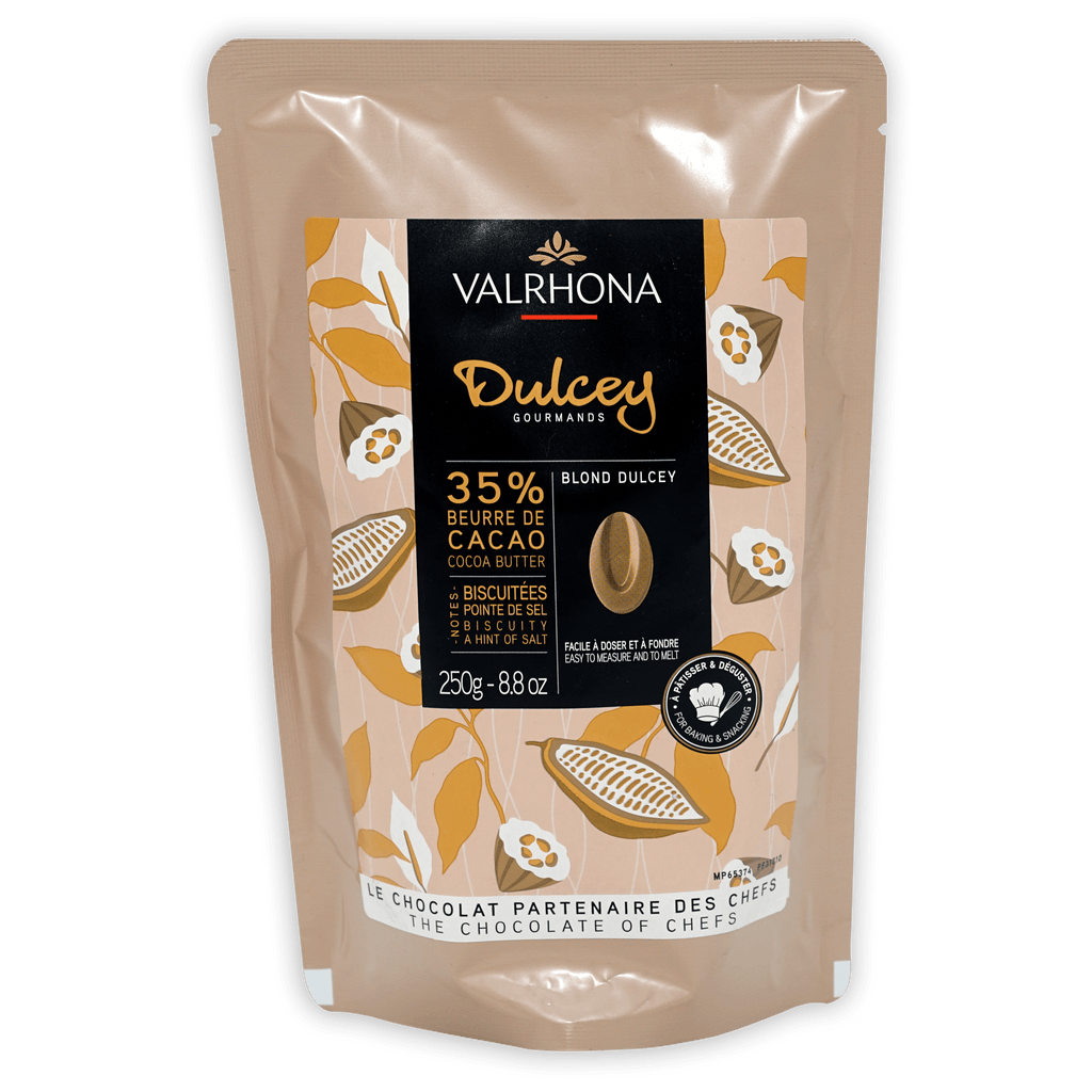Valrhona Dulcey 35% blond chocolate feves in beige pouch with cacao illustrations