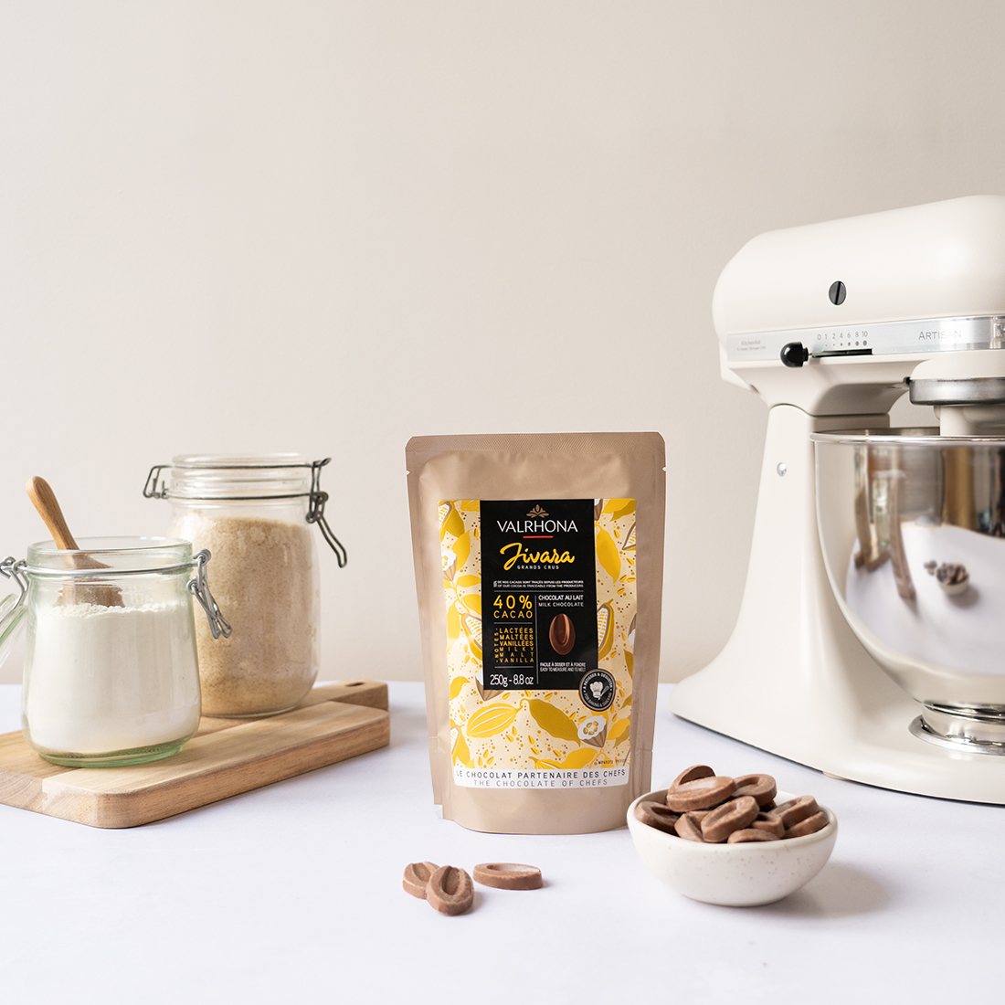 Valrhona Jivara 40% milk chocolate feves 250g pouch with a stand mixer and loose feves