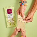 Domori White Chocolate w/ Sicilian Pistachios bar, creamy with green nuts