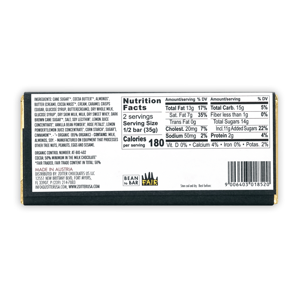 Zotter Butter Caramel 50% organic milk chocolate bar in dark green wrapper with gold foil edges