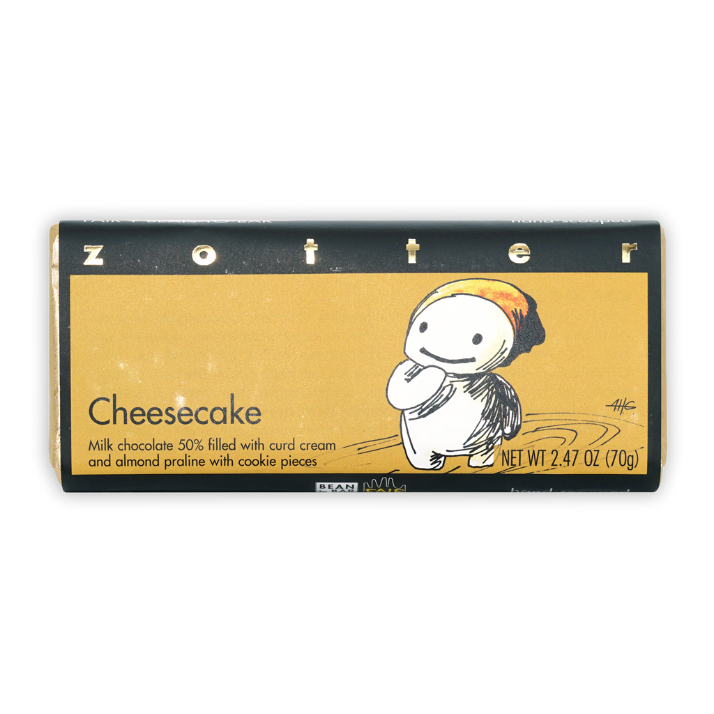 Zotter Cheesecake Milk Chocolate 50% bar with cartoon on golden wrapper