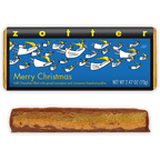 Zotter Merry Christmas wrapper with flying angels above a cut bar showing marzipan and praline.