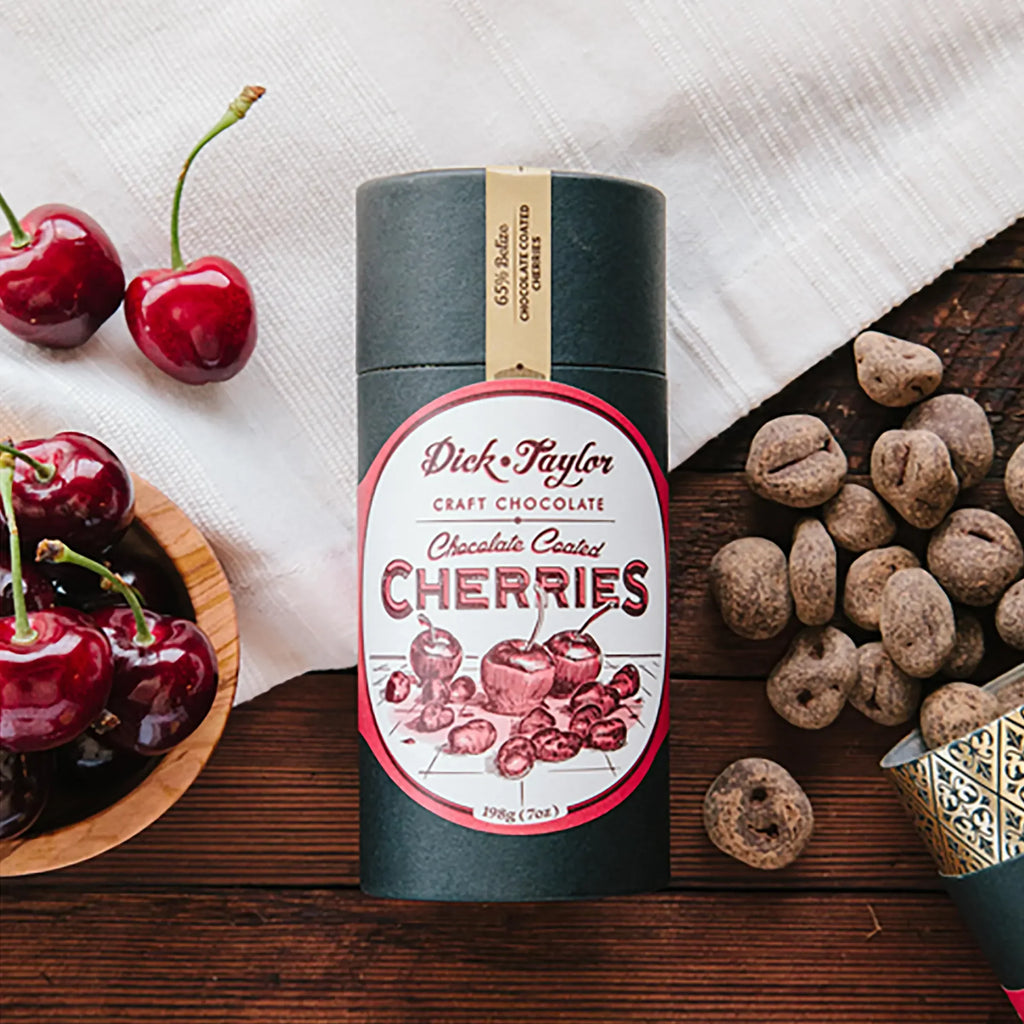 Dick Taylor 65% chocolate coated cherries dark green tube