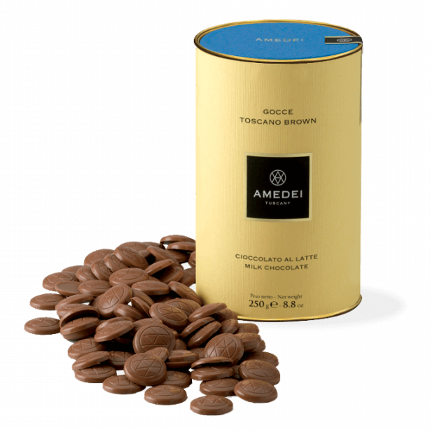 Amedei Gocce Toscano Latte milk chocolate chips in gold jar with blue lid