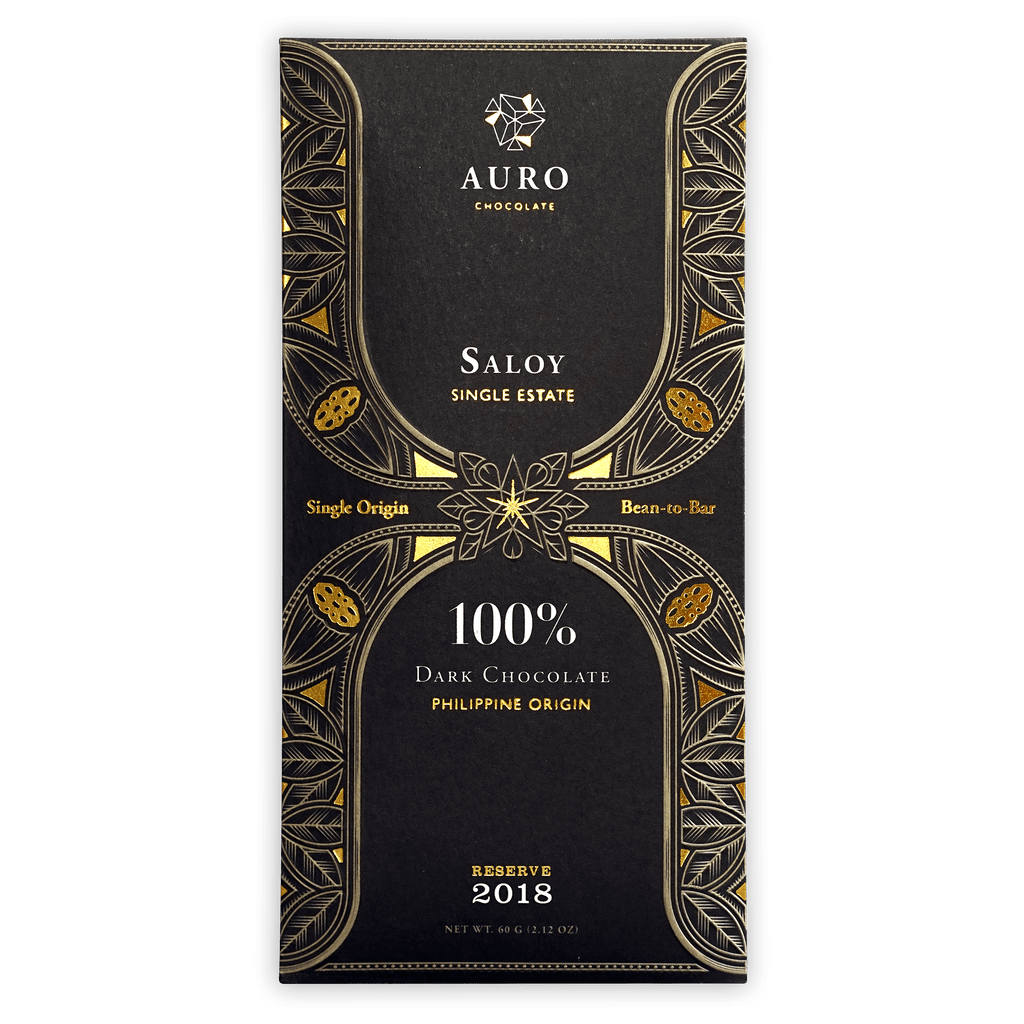 Auro Reserve Saloy 100% dark chocolate bar in black gold foil with leaf patterns