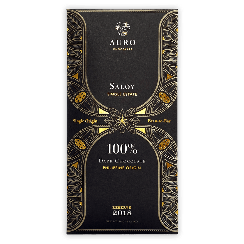 Auro Reserve Saloy 100% dark chocolate bar in black gold foil with leaf patterns