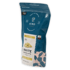 Auro White Chocolate Coins 32% in teal pouch with pink botanicals