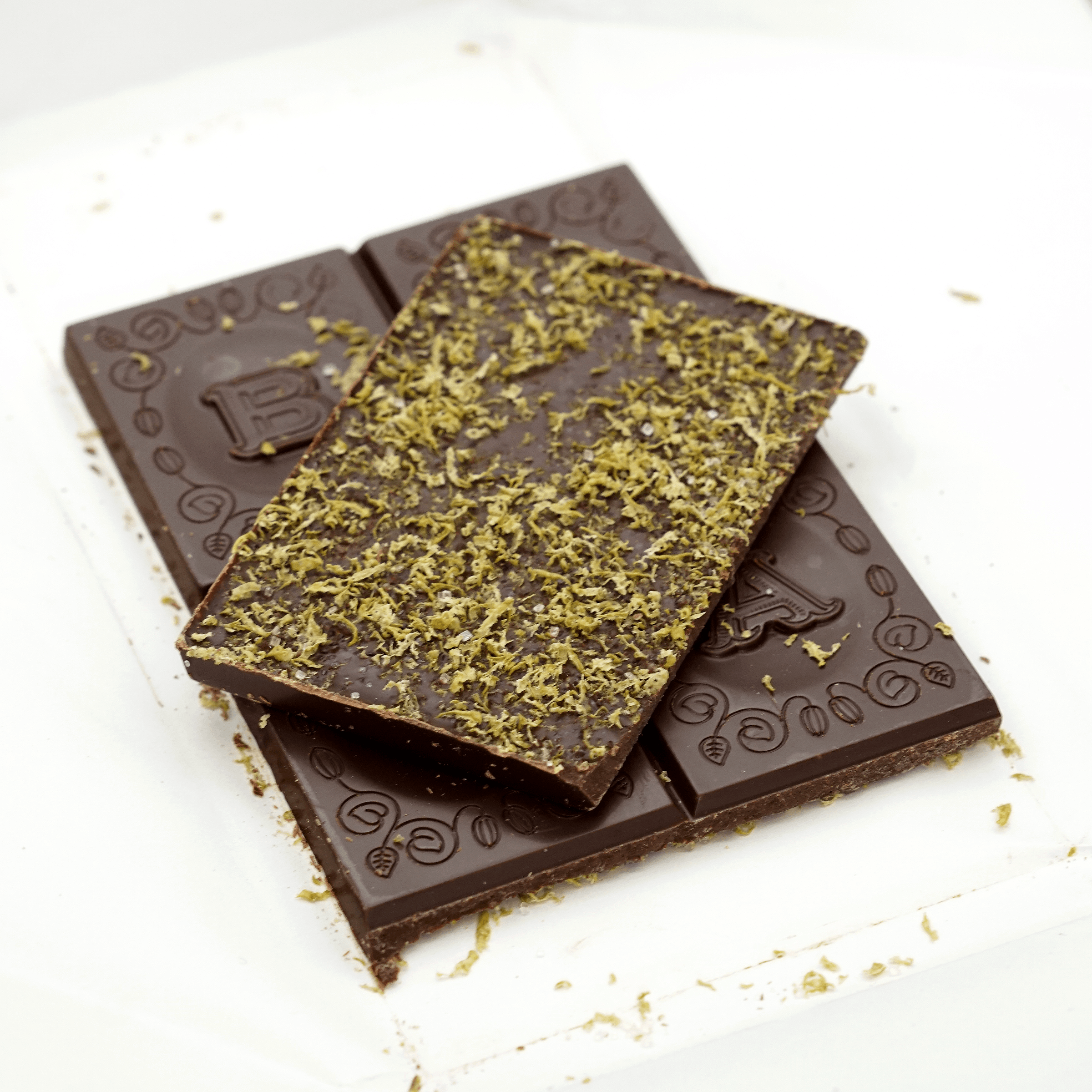 Baiani Dark w/ Caipirinha 65% bar topped with matcha powder