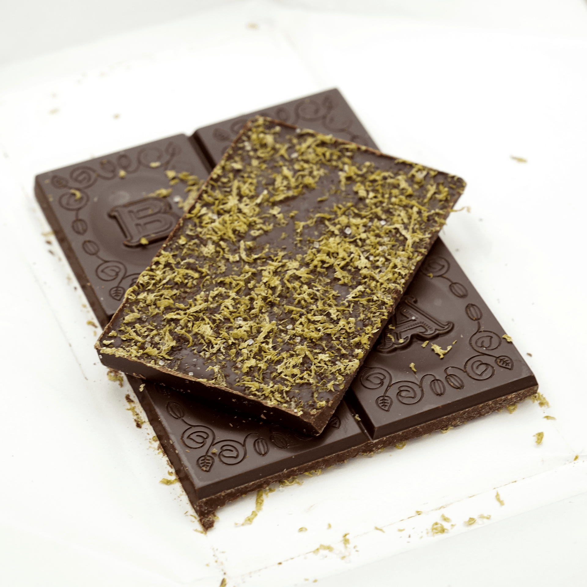 Baiani Dark w/ Caipirinha 65% bar topped with matcha powder