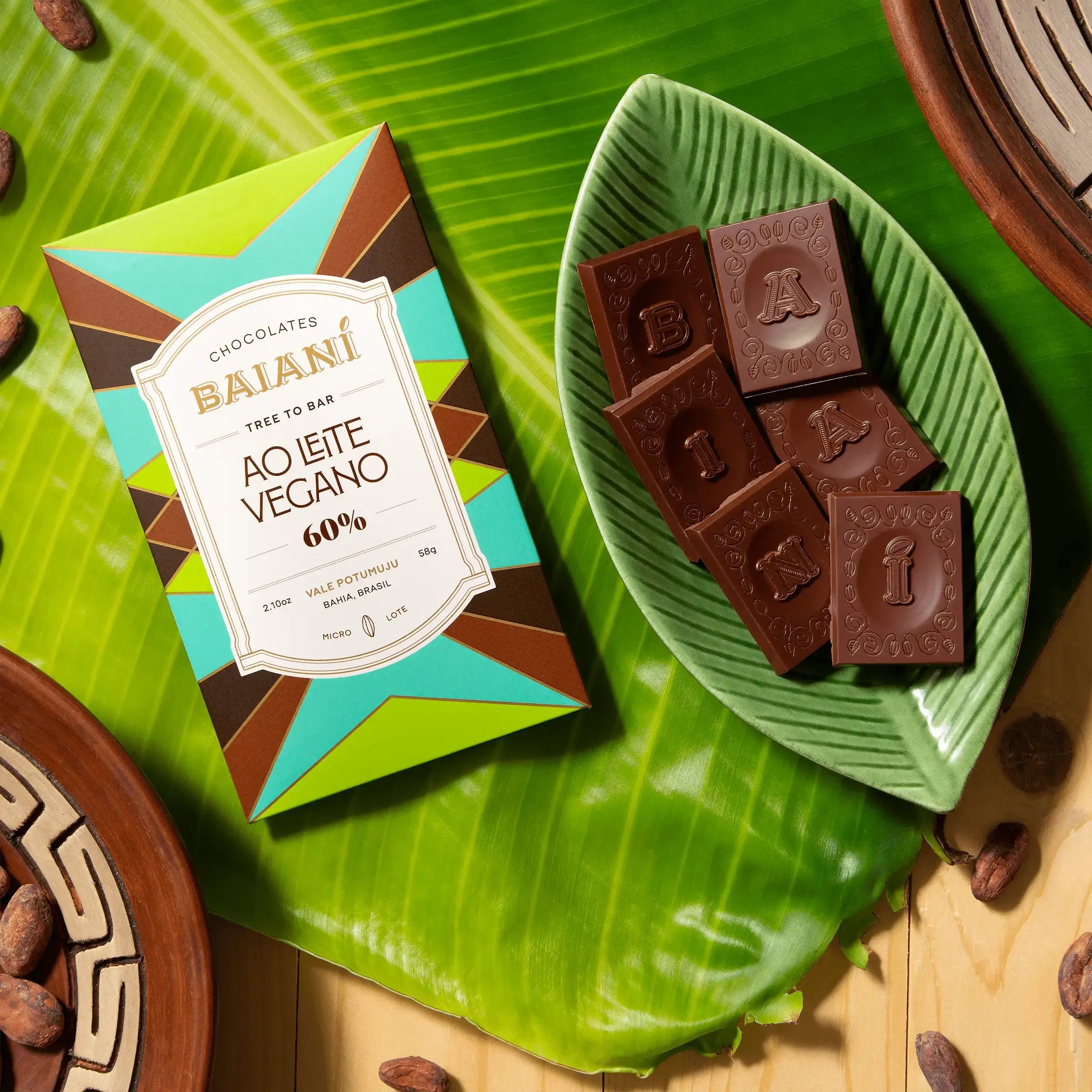 Vibrant geometric Baiani Vegan Milk Chocolate 60% bar wrapper in teal, brown, lime green