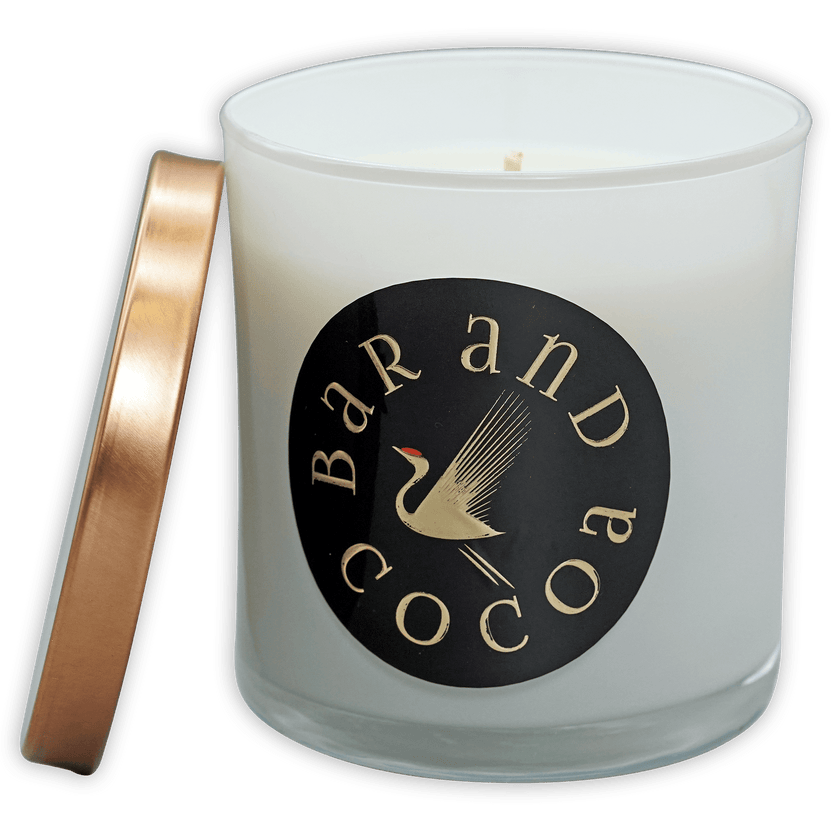 Bar & Cocoa chocolate candle in white frosted jar with rose gold lid